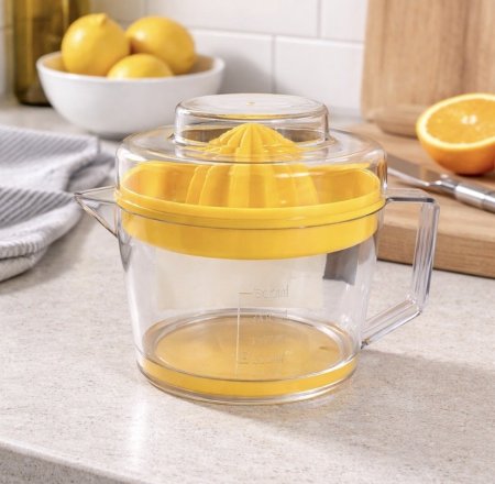 عصارة حمضيات يدوية مع غطا