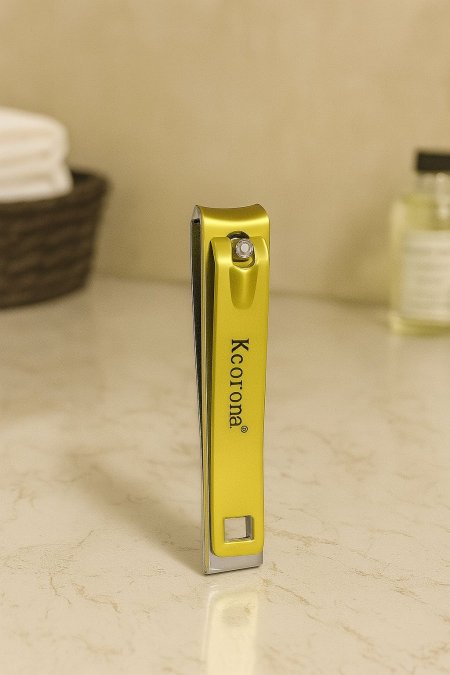 قصاصة اظافر ذهبي Kcorona