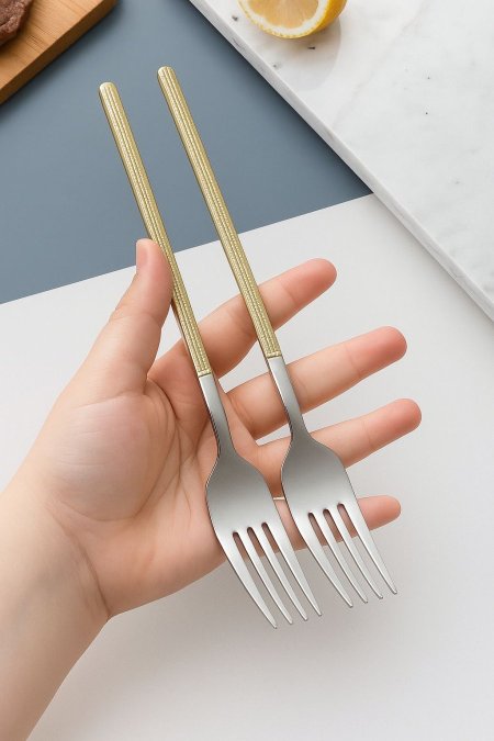 طقم شوك ستانلس ستيل يد ذهبي رفيع